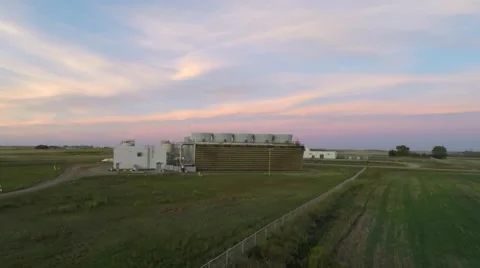 Epic sun down shot of a power plant facility Stock Footage 54888050