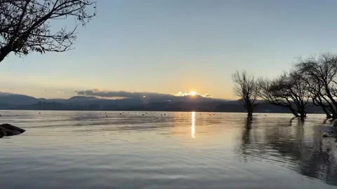Epic Sunrise Over Mountains Forward Motion Time-lapse From Water Surface Cap Stock Footage 328335896