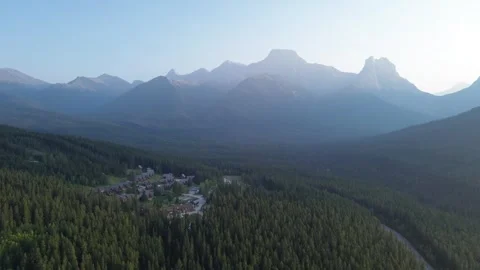 Epic Sunrise Over a Remote Mountain Valley Town Stock Footage 318818058