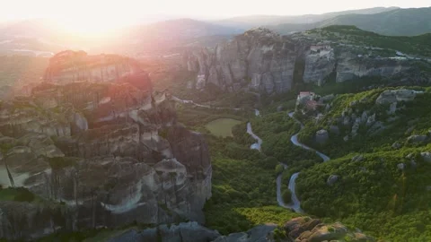 Epic Sunset Aerial View Holy Monastery of Great Meteoron Sun Flare. Wide Sh.. Stock Footage 334893619