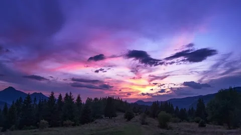 Epic sunset with colorful clouds, mountain forest landscape in europe.4K Stock-Footage 210232547