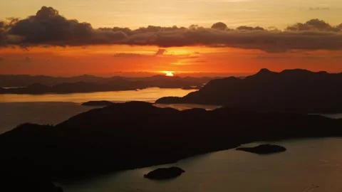 Epic sunset drone view over Coron islands Palawan Philippines golden horizon Видео 333164565
