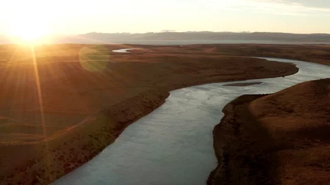 Epic sunset drone view of Santa Cruz river in Patagonia Stock Footage 111831936