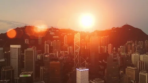 Epic sunset in financial center of Hong Kong. AERIAL view Stock Footage