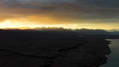 Epic Sunset over the Andes mountain range and the lake Viedma Stock Footage 255838986