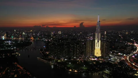 Epic sunset over Ho Chi Minh City, Vietnam aerial shot Vídeo Stock 154956400