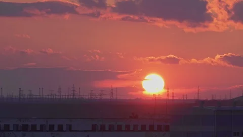 Epic sunset over the power station with a huge high-voltage supports Stock Footage 105534610