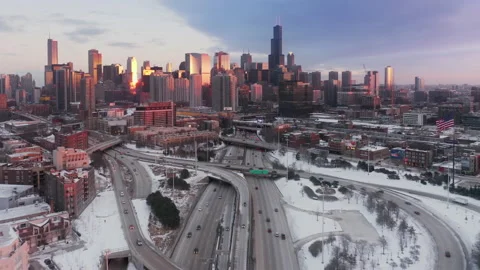 Epic sunset over winter Chicago downtown, Beautiful Chicago aerial above highway 스톡 동영상 163858894