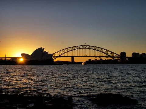 Epic Sunset Shot of Syndey Opera House and Harbour Bridge Stock Photos