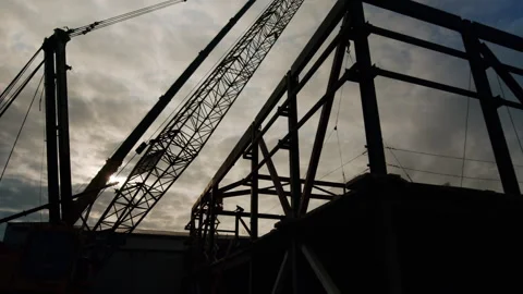 Epic Sunset Silhoette Of Construction Site 4K 48FPS SLO-MO Stock Footage 265701339