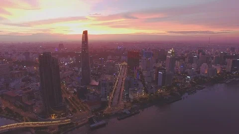 Epic sunset sky above Ho Chi Minh City downtown aerial shot Vídeo Stock 119013912