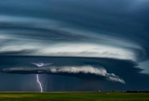 Epic Supercell Storm With Lightning Bolt Over a Farm in Kansas - TIFF Stock Photos