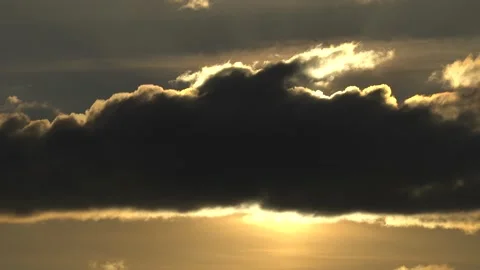Epic thunder rain storm cloud in colorful golden yellow cloudscape on dramatic Stock Footage 185512611