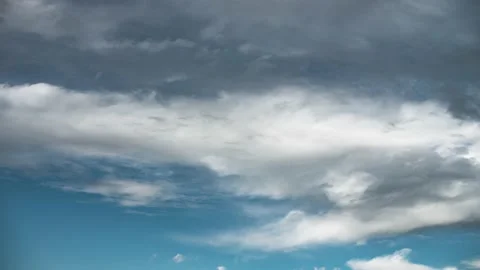 Epic time lapse of fast moving clouds and blue summer sky before dramatic storm. Stock Footage 179506386