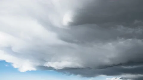 Epic time lapse of fast moving clouds and dark summer sky before dramatic storm. Stock Footage 179507756