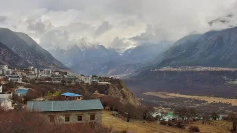 Epic Time-lapse of Snow and Moving Clouds Over Namcha Barwa Mountain Stock Footage 329342746