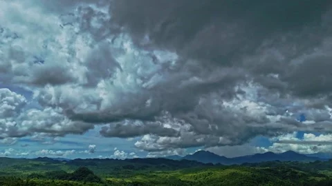Epic Timelapse of Stormy Clouds Rolling in over Jungle in Surigao Del Stock Footage 254555939