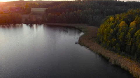 Epic Top Down Aerial View of Big Lake With Clear Blue Water. Reflection of .. Stock Footage 282585561