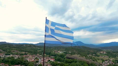 Epic Torn Greek Flag Blowing in Wind Close Up. Aerial Drone Around it With .. Stock Footage 334896262