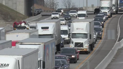 Epic Toronto highway traffic jam with cars and trucks on the busy 401 動画素材 151061645