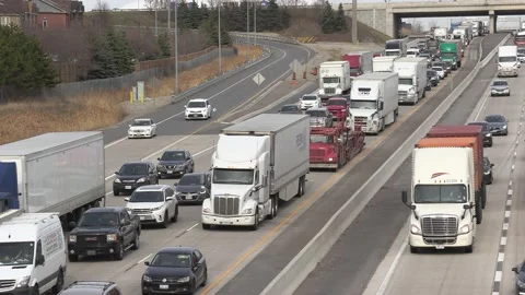 Epic Toronto highway traffic jam with cars and trucks on the busy 401 Stock Footage 151062143