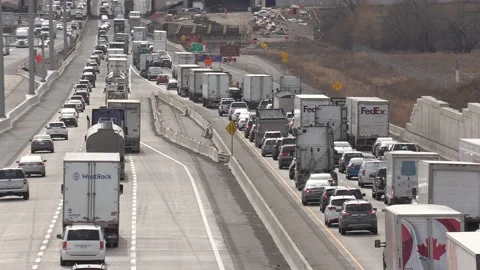 Epic Toronto highway traffic jam with cars and trucks on the busy 401 動画素材 151062236