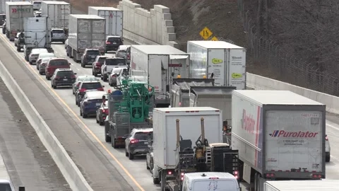 Epic Toronto highway traffic jam with cars and trucks on the busy 401 Vídeos de archivo 151062673
