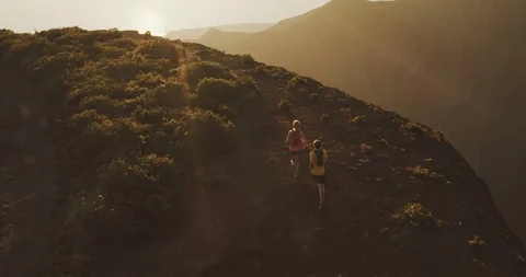 Epic trail running at sunset in the mountains Stock Footage 124713971