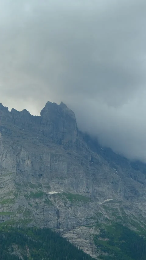 Epic view of the coming storm clouds in the mountains. travel and bad weather co Stock Footage 284633889