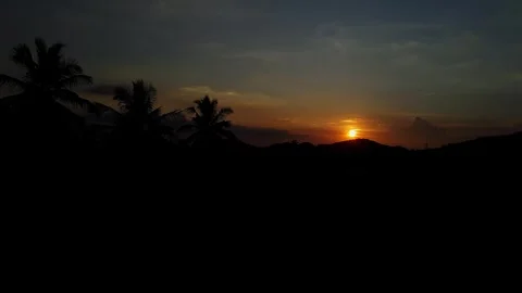 An epic view of a dark sunset over fields as seen from a speeding train.mov.. Stock Footage 313381073