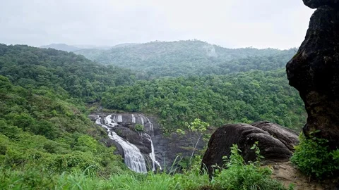 Epic view of lush forested mountains and Mallalli Waterfalls in Karnatakas .. Video stock 332354213