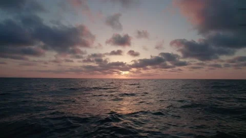 Epic view of the ocean and reflection of clouds and sun. Stock Footage 159074075