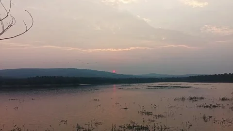 An epic view of a surreal and bizarre colorful sunset or sunrise over mount.. Stock Footage 313382153