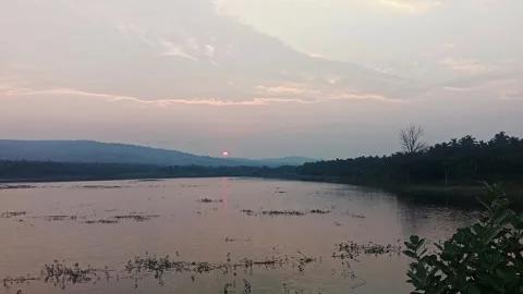 An epic view of a surreal and bizarre colorful sunset or sunrise over mount.. 스톡 동영상 313382154