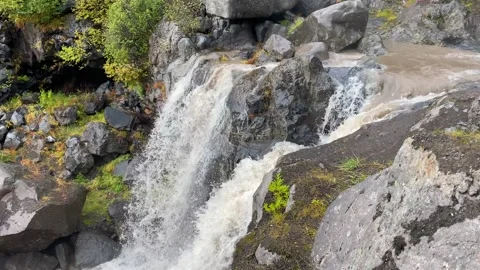 Epic view of a two-stage waterfall that turns into a small mountain river Stock-Footage 140577048