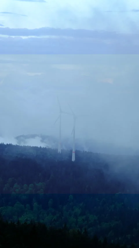 Epic view of wind turbines on the mountain in the low clouds and fog Stock Footage 278092035