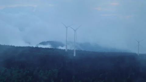 Epic view of wind turbines on the mountain in the low clouds and fog Stock Footage 278092739