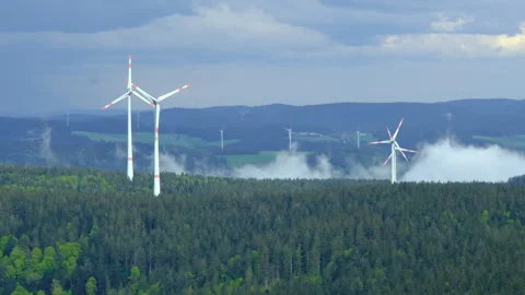 Epic view of wind turbines on the mountain in the low clouds and fog Stock Footage 278111209