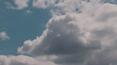 Epic volumetric big clouds fly in the sky Stock Footage 128961453