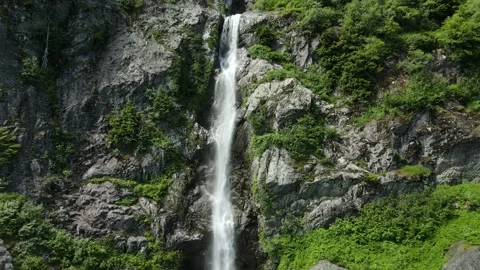 Epic Waterfall in a Beautiful Rain Forest, Drone Shot Stock Footage 169554573