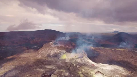 Epic Wide Landscape Smoking Volcano Lava Field. Drone Flies Back Across Mountain Stock Footage 256714978