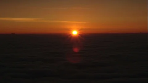 Epic winter sunrise above the clouds 動画素材 72524654