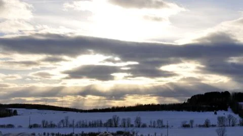 Epic winter sunset with clouds Stock Photos
