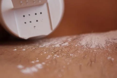 Epilation of the bikini area. Close-up of liquid wax hair removal. Shugaring Stock Photos