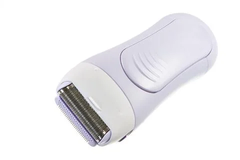 Epilator Closeup of an eletrical lady shaver Copyright: xZoonar.com/manfre... Stock Photos