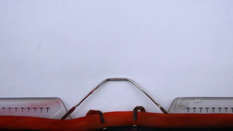 Episode 4 - phrase printed on an old typewriter in red letters, close up. Stock Footage 126776895