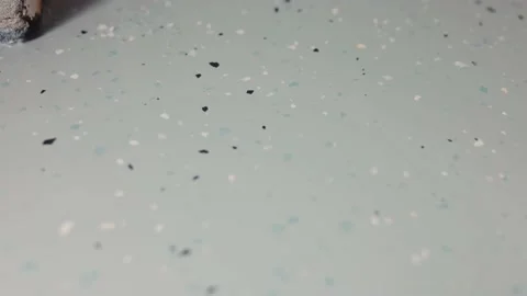 Epoxy non-slip gray flooring system decorated with chips Stock Footage 235715192