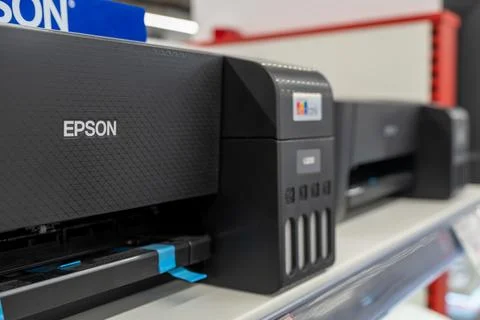 Epson logo on a printer close-up. Minsk, Belarus - November 6, 2024 库存照片