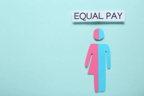 Equal pay concept. Human paper figure as male and female halves against lig.. Stock Photos