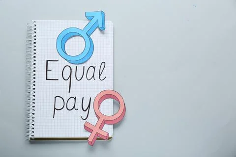 Equal pay. Open notebook and gender symbols on light grey background, top v.. Stock Photos